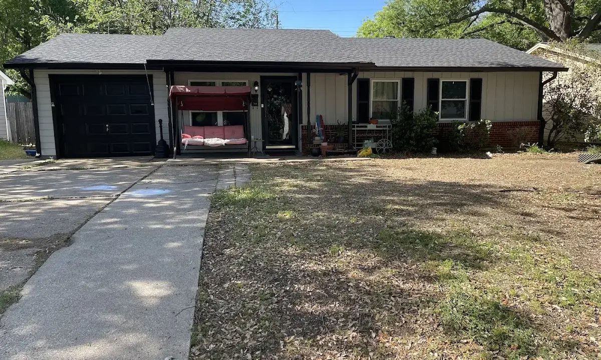 Hail Damage Roof Repair crew at work on a residential roof in Gainesville